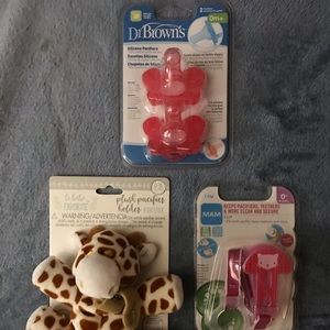 Bundle of pacifier goods.
